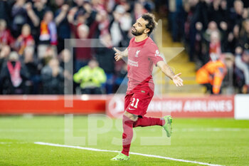 2022-10-04 - Liverpool forward Mohamed Salah (11) celebrates his goal 2-0 during the UEFA Champions League, Group A football match between Liverpool and Rangers on October 4, 2022 at Anfield stadium in Liverpool, England - FOOTBALL - CHAMPIONS LEAGUE - LIVERPOOL V RANGERS - UEFA CHAMPIONS LEAGUE - SOCCER