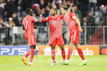 2022-10-04 - Serge Gnabry of Bayern Munich celebrates his goal 2-0 with Sadio Mane, Leon Goretzka during the UEFA Champions League, Group C football match between Bayern Munich and Viktoria Pilsen on October 4, 2022 at Allianz Arena in Munich, Germany - FOOTBALL - CHAMPIONS LEAGUE - BAYERN MUNICH V VIKTORIA PLZEN - UEFA CHAMPIONS LEAGUE - SOCCER