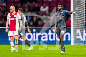 2022-10-04 - Andre-Frank Zambo Anguissa of Napoli during the UEFA Champions League, Group A football match between Ajax and Napoli on October 4, 2022 at Johan Cruijff ArenA in Amsterdam, Netherlands - FOOTBALL - CHAMPIONS LEAGUE - AJAX V NAPOLI - UEFA CHAMPIONS LEAGUE - SOCCER