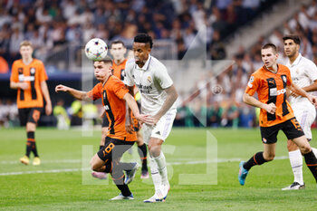 2022-10-05 - Eder Militao of Real Madrid and Georgiy Sudakov of Shakhtar during the UEFA Champions League, Group F, football match between Real Madrid and Shakhtar Donetsk on October 5, 2022 at Santiago Bernabeu stadium in Madrid, Spain - FOOTBALL - CHAMPIONS LEAGUE - REAL MADRID V SHAKHTAR DONETSK - UEFA CHAMPIONS LEAGUE - SOCCER