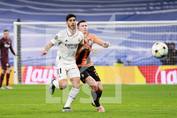 2022-10-05 - Marco Asensio of Real Madrid and Mykola Matvienko of Shakhtar during the UEFA Champions League, Group F, football match between Real Madrid and Shakhtar Donetsk on October 5, 2022 at Santiago Bernabeu stadium in Madrid, Spain - FOOTBALL - CHAMPIONS LEAGUE - REAL MADRID V SHAKHTAR DONETSK - UEFA CHAMPIONS LEAGUE - SOCCER