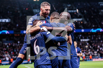 2022-10-11 - Kylian Mbappe of PSG celebrates after his goal with Marco Verratti, Sergio Ramos, Danilo during the UEFA Champions League, Group H football match between Paris Saint-Germain and SL Benfica on October 11, 2022 at Parc des Princes stadium in Paris, France - FOOTBALL - CHAMPIONS LEAGUE - PARIS SG V BENFICA - UEFA CHAMPIONS LEAGUE - SOCCER