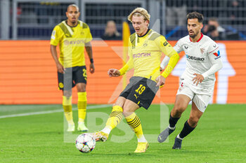 2022-10-11 - Julian Brandt of Borussia Dortmund, Suso of Sevilla during the UEFA Champions League, Group G football match between Borussia Dortmund and Sevilla FC on October 11, 2022 at Signal Iduna Park in Dortmund, Germany - FOOTBALL - CHAMPIONS LEAGUE - BORUSSIA DORTMUND V SEVILLA - UEFA CHAMPIONS LEAGUE - SOCCER