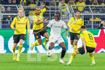 2022-10-11 - Nianzou Tanguy Kouassi of Sevilla during the UEFA Champions League, Group G football match between Borussia Dortmund and Sevilla FC on October 11, 2022 at Signal Iduna Park in Dortmund, Germany - FOOTBALL - CHAMPIONS LEAGUE - BORUSSIA DORTMUND V SEVILLA - UEFA CHAMPIONS LEAGUE - SOCCER