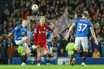 2022-10-12 - John Lundstram of Rangers, Roberto Firmino of Liverpool during the UEFA Champions League, Group A football match between Rangers and Liverpool on October 12, 2022 at Ibrox stadium in Glasgow, Scotland - FOOTBALL - CHAMPIONS LEAGUE - RANGERS V LIVERPOOL - UEFA CHAMPIONS LEAGUE - SOCCER