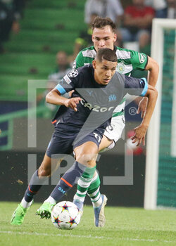 2022-10-12 - Amine Harit Olympique Marseille and Manuel Ugarte of Sporting Club Portugal during the UEFA Champions League, Group D football match between Sporting CP and Olympique de Marseille on October 12, 2022 at Jose Alvalade stadium in Lisbon, Portugal - FOOTBALL - CHAMPIONS LEAGUE - SPORTING V MARSEILLE - UEFA CHAMPIONS LEAGUE - SOCCER