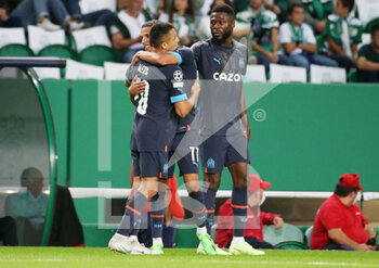 2022-10-12 - Alexis Sanchez of Olympique Marseille celebrates his goal 0-2 with Amine Harit during the UEFA Champions League, Group D football match between Sporting CP and Olympique de Marseille on October 12, 2022 at Jose Alvalade stadium in Lisbon, Portugal - FOOTBALL - CHAMPIONS LEAGUE - SPORTING V MARSEILLE - UEFA CHAMPIONS LEAGUE - SOCCER