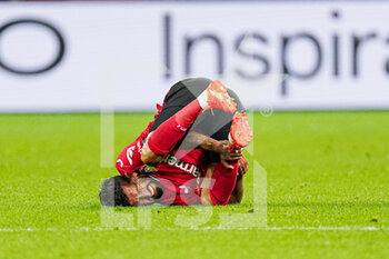 2022-10-12 - Kerem Demirbay of Bayer 04 Leverkusen hurts during the UEFA Champions League, Group B football match between Bayer 04 Leverkusen and FC Porto on October 12, 2022 at the BayArena in Leverkusen, Germany - FOOTBALL - CHAMPIONS LEAGUE - BAYER LEVERKUSEN V FC PORTO - UEFA CHAMPIONS LEAGUE - SOCCER