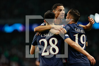 2022-10-25 - Carlos Soler of PSG celebrates with Hugo Ekitike and Pablo Sarabia during the UEFA Champions League, Group H football match between Paris Saint-Germain and Maccabi Haifa on October 25, 2022 at Parc des Princes stadium in Paris, France - FOOTBALL - CHAMPIONS LEAGUE - PARIS SG V MACCABI HAIFA - UEFA CHAMPIONS LEAGUE - SOCCER