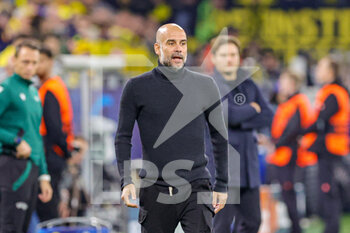 2022-10-25 - Pep Guardiola Head Coach of Manchester City during the UEFA Champions League, Group G football match between Borussia Dortmund and Manchester City on October 25, 2022 at Signal Iduna Park in Dortmund, Germany - FOOTBALL - CHAMPIONS LEAGUE - DORTMUND V MANCHESTER CITY - UEFA CHAMPIONS LEAGUE - SOCCER