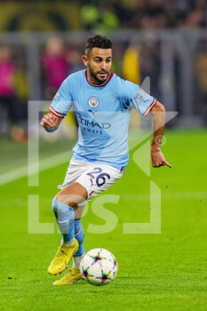 2022-10-25 - Riyad Mahrez (26) of Manchester City during the UEFA Champions League, Group G football match between Borussia Dortmund and Manchester City on October 25, 2022 at Signal Iduna Park in Dortmund, Germany - FOOTBALL - CHAMPIONS LEAGUE - DORTMUND V MANCHESTER CITY - UEFA CHAMPIONS LEAGUE - SOCCER