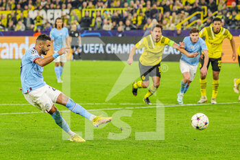 2022-10-25 - Riyad Mahrez (26) of Manchester City takes a penalty which is saved during the UEFA Champions League, Group G football match between Borussia Dortmund and Manchester City on October 25, 2022 at Signal Iduna Park in Dortmund, Germany - FOOTBALL - CHAMPIONS LEAGUE - DORTMUND V MANCHESTER CITY - UEFA CHAMPIONS LEAGUE - SOCCER