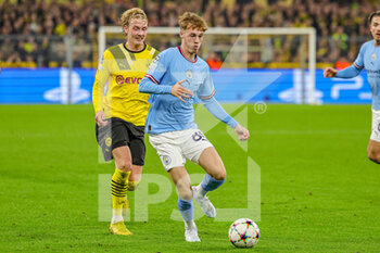 2022-10-25 - Cole Palmer (80) of Manchester City and Julian Brandt of Borussia Dortmund during the UEFA Champions League, Group G football match between Borussia Dortmund and Manchester City on October 25, 2022 at Signal Iduna Park in Dortmund, Germany - FOOTBALL - CHAMPIONS LEAGUE - DORTMUND V MANCHESTER CITY - UEFA CHAMPIONS LEAGUE - SOCCER