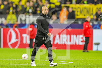 2022-10-25 - Pep Guardiola Head Coach of Manchester City at full time during the UEFA Champions League, Group G football match between Borussia Dortmund and Manchester City on October 25, 2022 at Signal Iduna Park in Dortmund, Germany - FOOTBALL - CHAMPIONS LEAGUE - DORTMUND V MANCHESTER CITY - UEFA CHAMPIONS LEAGUE - SOCCER