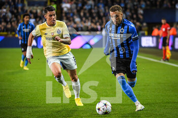 2022-10-26 - Mateus URIBE of FC Porto and Noa LANG of Brugge during the UEFA Champions League, Group B football match between Club Brugge and FC Porto on October 26, 2022 at Jan Breydelstadion in Bruges, Belgium - FOOTBALL - CHAMPIONS LEAGUE - CLUB BRUGGE V FC PORTO - UEFA CHAMPIONS LEAGUE - SOCCER