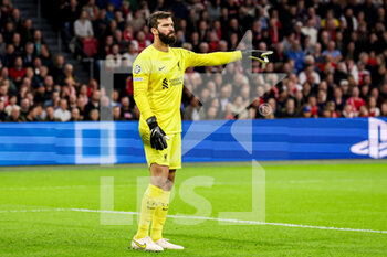 2022-10-26 - Alisson Becker of Liverpool during the UEFA Champions League, Group A football match between Ajax and Liverpool on October 26, 2022 at Johan Cruijff ArenA in Amsterdam, Netherlands - FOOTBALL - CHAMPIONS LEAGUE - AJAX V LIVERPOOL - UEFA CHAMPIONS LEAGUE - SOCCER