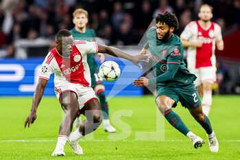 2022-10-26 - Brian Brobbey of Ajax, Joe Gomez of Liverpool during the UEFA Champions League, Group A football match between Ajax and Liverpool on October 26, 2022 at Johan Cruijff ArenA in Amsterdam, Netherlands - FOOTBALL - CHAMPIONS LEAGUE - AJAX V LIVERPOOL - UEFA CHAMPIONS LEAGUE - SOCCER