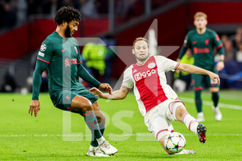 2022-10-26 - Joe Gomez of Liverpool FC, Daley Blind of Ajax during the UEFA Champions League, Group A football match between Ajax and Liverpool on October 26, 2022 at Johan Cruijff ArenA in Amsterdam, Netherlands - FOOTBALL - CHAMPIONS LEAGUE - AJAX V LIVERPOOL - UEFA CHAMPIONS LEAGUE - SOCCER
