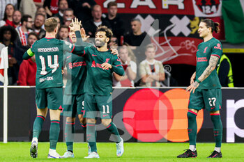 2022-10-26 - Mohamed Salah of Liverpool FC celebrates after scoring the first goal during the UEFA Champions League, Group A football match between Ajax and Liverpool on October 26, 2022 at Johan Cruijff ArenA in Amsterdam, Netherlands - FOOTBALL - CHAMPIONS LEAGUE - AJAX V LIVERPOOL - UEFA CHAMPIONS LEAGUE - SOCCER