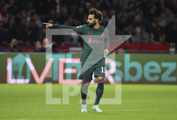 2022-10-26 - Mohamed Salah of Liverpool celebrates his goal during the UEFA Champions League, Group A football match between Ajax Amsterdam and Liverpool FC on October 26, 2022 at Johan Cruijff ArenA in Amsterdam, Netherlands - FOOTBALL - CHAMPIONS LEAGUE - AJAX V LIVERPOOL - UEFA CHAMPIONS LEAGUE - SOCCER