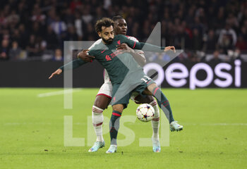 2022-10-26 - Mohamed Salah of Liverpool during the UEFA Champions League, Group A football match between Ajax Amsterdam and Liverpool FC on October 26, 2022 at Johan Cruijff ArenA in Amsterdam, Netherlands - FOOTBALL - CHAMPIONS LEAGUE - AJAX V LIVERPOOL - UEFA CHAMPIONS LEAGUE - SOCCER