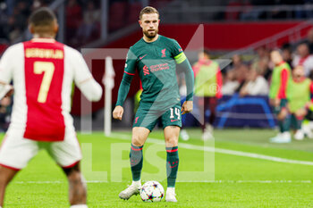 2022-10-26 - Jordan Henderson of Liverpool during the UEFA Champions League, Group A football match between Ajax and Liverpool on October 26, 2022 at Johan Cruijff ArenA in Amsterdam, Netherlands - FOOTBALL - CHAMPIONS LEAGUE - AJAX V LIVERPOOL - UEFA CHAMPIONS LEAGUE - SOCCER