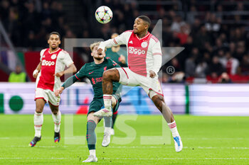 2022-10-26 - Harvey Elliott of Liverpool FC, Steven Bergwijn of Ajax during the UEFA Champions League, Group A football match between Ajax and Liverpool on October 26, 2022 at Johan Cruijff ArenA in Amsterdam, Netherlands - FOOTBALL - CHAMPIONS LEAGUE - AJAX V LIVERPOOL - UEFA CHAMPIONS LEAGUE - SOCCER