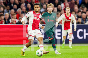 2022-10-26 - Owen Wijndal of Ajax, Harvey Elliott of Liverpool during the UEFA Champions League, Group A football match between Ajax and Liverpool on October 26, 2022 at Johan Cruijff ArenA in Amsterdam, Netherlands - FOOTBALL - CHAMPIONS LEAGUE - AJAX V LIVERPOOL - UEFA CHAMPIONS LEAGUE - SOCCER