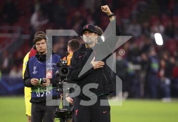 2022-10-26 - Coach of Liverpool Jurgen Klopp celebrates the victory with the supporters following the UEFA Champions League, Group A football match between Ajax Amsterdam and Liverpool FC on October 26, 2022 at Johan Cruijff ArenA in Amsterdam, Netherlands - FOOTBALL - CHAMPIONS LEAGUE - AJAX V LIVERPOOL - UEFA CHAMPIONS LEAGUE - SOCCER
