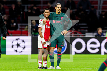 2022-10-26 - Jurrien Timber of Ajax, Virgil van Dijk of Liverpool FC during the UEFA Champions League, Group A football match between Ajax and Liverpool on October 26, 2022 at Johan Cruijff ArenA in Amsterdam, Netherlands - FOOTBALL - CHAMPIONS LEAGUE - AJAX V LIVERPOOL - UEFA CHAMPIONS LEAGUE - SOCCER