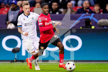 2022-11-01 - Jeremie Frimpong of Bayer 04 Leverkusen, Noa Lang of Club Brugge KV during the UEFA Champions League, Group B football match between Bayer 04 Leverkusen and Club Brugge KV on November 1, 2022 at the BayArena in Leverkusen, Germany - FOOTBALL - CHAMPIONS LEAGUE - BAYER LEVERKUSEN V CLUB BRUGGE - UEFA CHAMPIONS LEAGUE - SOCCER