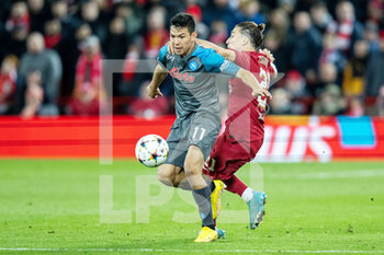 2022-11-01 - Napoli midfielder Hirving Lozano (11) battles for possession with Liverpool defender Kostas Tsimikas during the UEFA Champions League, Group A football match between Liverpool FC and SSC Napoli on November 1, 2022 at Anfield stadium in Liverpool, England - FOOTBALL - CHAMPIONS LEAGUE - LIVERPOOL V NAPOLI - UEFA CHAMPIONS LEAGUE - SOCCER