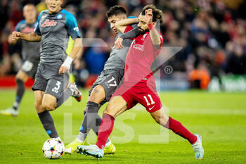 2022-11-01 - Mathias Olivera of Napoli and Liverpool forward Mohamed Salah (11) during the UEFA Champions League, Group A football match between Liverpool FC and SSC Napoli on November 1, 2022 at Anfield stadium in Liverpool, England - FOOTBALL - CHAMPIONS LEAGUE - LIVERPOOL V NAPOLI - UEFA CHAMPIONS LEAGUE - SOCCER
