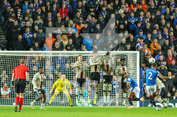 2022-11-01 - James Tavernier of Rangers takes a free kick during the UEFA Champions League, Group A football match between Rangers and Ajax on November 1, 2022 at Ibrox stadium in Glasgow, Scotland - FOOTBALL - CHAMPIONS LEAGUE - RANGERS V AJAX - UEFA CHAMPIONS LEAGUE - SOCCER