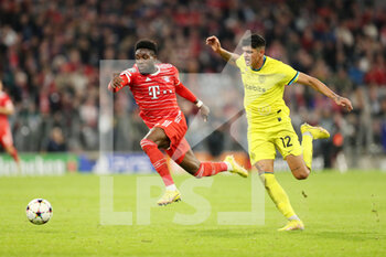 2022-11-01 - Alphonso Davies of Bayern Munich and Raoul Bellanova of Inter during the UEFA Champions League, Group C football match between Bayern Munich and FC Internazionale on November 1, 2022 at Allianz Arena in Munich, Germany - FOOTBALL - CHAMPIONS LEAGUE - BAYERN MUNICH V INTERNAZIONALE - UEFA CHAMPIONS LEAGUE - SOCCER