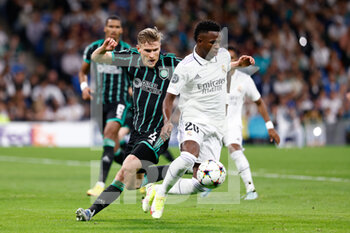 2022-11-02 - Vinicius Junior of Real Madrid and Carl Starfelt of Celtic during the UEFA Champions League, Group F football match between Real Madrid and Celtic FC on November 2, 2022 at Santiago Bernabeu stadium in Madrid, Spain - FOOTBALL - CHAMPIONS LEAGUE - REAL MADRID V CELTIC - UEFA CHAMPIONS LEAGUE - SOCCER