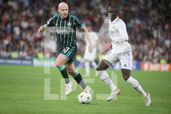 2022-11-02 - Ferland Mendy of Real Madrid, Aaron Mooy of Celtic during the UEFA Champions League, Group F football match between Real Madrid CF and Celtic FC on November 2, 2022 at Santiago Bernabeu stadium in Madrid, Spain - FOOTBALL - CHAMPIONS LEAGUE - REAL MADRID V CELTIC - UEFA CHAMPIONS LEAGUE - SOCCER