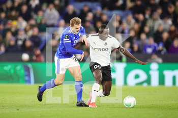 2022-02-17 - Randers forward Alhaji Kamara (99) holds off Leicester City Midfielder Kiernan Dewsbury-Hall (22) during the UEFA Europa Conference League, Play-off, 1st leg football match between Leicester City and Randers FC on February 17, 2022 at the King Power Stadium in Leicester, England - LEICESTER CITY VS RANDERS FC - UEFA CONFERENCE LEAGUE - SOCCER