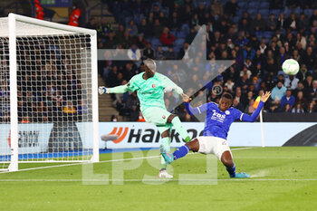 2022-03-10 - Rennes Goalkeeper Alfred Gomis (16) just clears ahead of Leicester City Forward Patson Daka (29) during the UEFA Conference League, Round of 16, 1st leg football match between Leicester City and Stade Rennais (Rennes) on March 10, 2022 at King Power Stadium in Leicester, England - LEICESTER CITY VS STADE RENNAIS (RENNES) - UEFA CONFERENCE LEAGUE - SOCCER