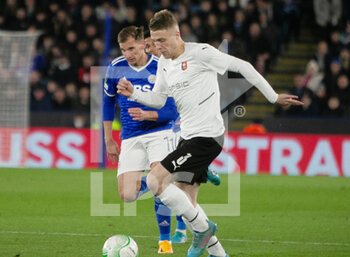 2022-03-10 - Adrien Truffert of Stade Rennais and Marc Albrighton of Leicester FC during the UEFA Conference League, Round of 16, 1st leg football match between Leicester City and Stade Rennais (Rennes) on March 10, 2022 at King Power Stadium in Leicester, England - LEICESTER CITY VS STADE RENNAIS (RENNES) - UEFA CONFERENCE LEAGUE - SOCCER