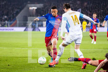 2022-03-17 - BASEL, SWITZERLAND - MARCH 17: Dan Ndoye of Basel (L) against Luan Peres of Marseille (R) during the UEFA Conference League Round of 16 Leg Two match between FC Basel and Olympique Marseille at  on March 17, 2022 in Basel, Switzerland. - FC BASEL AND OLYMPIQUE MARSEILLE - UEFA CONFERENCE LEAGUE - SOCCER