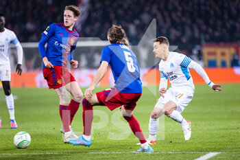 2022-03-17 - BASEL, SWITZERLAND - MARCH 17: Valentin Rongier of Marseille (R) against Michael Lang of Basel (L) during the UEFA Conference League Round of 16 Leg Two match between FC Basel and Olympique Marseille at  on March 17, 2022 in Basel, Switzerland. - FC BASEL AND OLYMPIQUE MARSEILLE - UEFA CONFERENCE LEAGUE - SOCCER