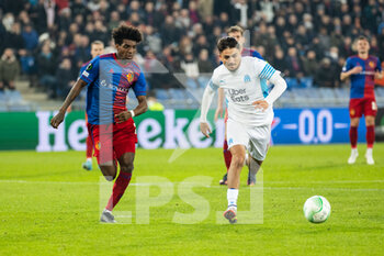 2022-03-17 - BASEL, SWITZERLAND - MARCH 17: Cengiz Under of Marseille (R) against Tomás Tavares of Basel (L) during the UEFA Conference League Round of 16 Leg Two match between FC Basel and Olympique Marseille at  on March 17, 2022 in Basel, Switzerland. - FC BASEL AND OLYMPIQUE MARSEILLE - UEFA CONFERENCE LEAGUE - SOCCER