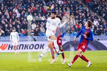 2022-03-17 - BASEL, SWITZERLAND - MARCH 17: Duje Caleta-Car of Marseille heads the ball during the UEFA Conference League Round of 16 Leg Two match between FC Basel and Olympique Marseille at  on March 17, 2022 in Basel, Switzerland. - FC BASEL AND OLYMPIQUE MARSEILLE - UEFA CONFERENCE LEAGUE - SOCCER