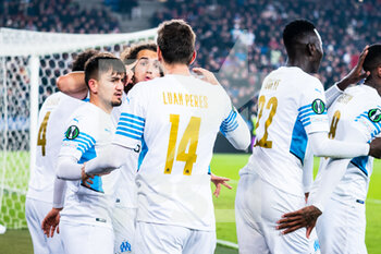 2022-03-17 - BASEL, SWITZERLAND - MARCH 17: Cengiz Under of Marseille (L) celebrating the opening goal with his teammates during the UEFA Conference League Round of 16 Leg Two match between FC Basel and Olympique Marseille at  on March 17, 2022 in Basel, Switzerland. - FC BASEL AND OLYMPIQUE MARSEILLE - UEFA CONFERENCE LEAGUE - SOCCER