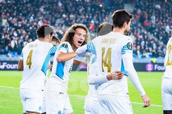 2022-03-17 - BASEL, SWITZERLAND - MARCH 17: Matteo Guendouzi of Marseille (L) celebrating the opening goal with his teammatesl during the UEFA Conference League Round of 16 Leg Two match between FC Basel and Olympique Marseille at  on March 17, 2022 in Basel, Switzerland. - FC BASEL AND OLYMPIQUE MARSEILLE - UEFA CONFERENCE LEAGUE - SOCCER