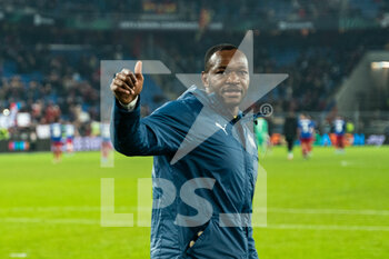2022-03-17 - BASEL, SWITZERLAND - MARCH 17: Goalkeeper Steve Mandanda of Marseille celebrates with his teammates after winning the UEFA Conference League Round of 16 Leg Two match between FC Basel and Olympique Marseille at  on March 17, 2022 in Basel, Switzerland. - FC BASEL AND OLYMPIQUE MARSEILLE - UEFA CONFERENCE LEAGUE - SOCCER
