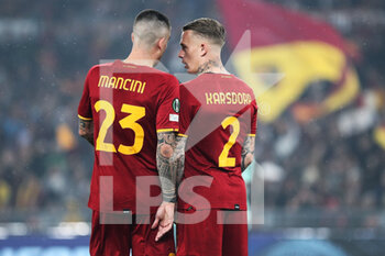 2022-05-05 - Gianluca Mancini (L) and Rick Karsdorp (R) of Roma talk each other during the UEFA Conference League, Semi-finals, 2nd leg football match between AS Roma and Leicester City on May 5, 2022 at Stadio Olimpico in Rome, Italy - AS ROMA VS LEICESTER CITY - UEFA CONFERENCE LEAGUE - SOCCER