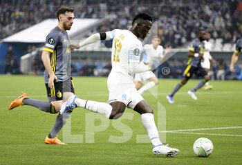 2022-05-05 - Bamba Dieng of Marseille, Orkun Kokcu of Feyenoord (left) during the UEFA Europa Conference League semi-final second leg football match between Olympique de Marseille (OM) and Feyenoord Rotterdam on May 5, 2022 at Stade Velodrome in Marseille, France - OLYMPIQUE DE MARSEILLE (OM) VS FEYENOORD ROTTERDAM - UEFA CONFERENCE LEAGUE - SOCCER
