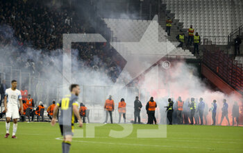 2022-05-05 - Supporters of Feyenoord sending flares on the pitch during the UEFA Europa Conference League semi-final second leg football match between Olympique de Marseille (OM) and Feyenoord Rotterdam on May 5, 2022 at Stade Velodrome in Marseille, France - OLYMPIQUE DE MARSEILLE (OM) VS FEYENOORD ROTTERDAM - UEFA CONFERENCE LEAGUE - SOCCER